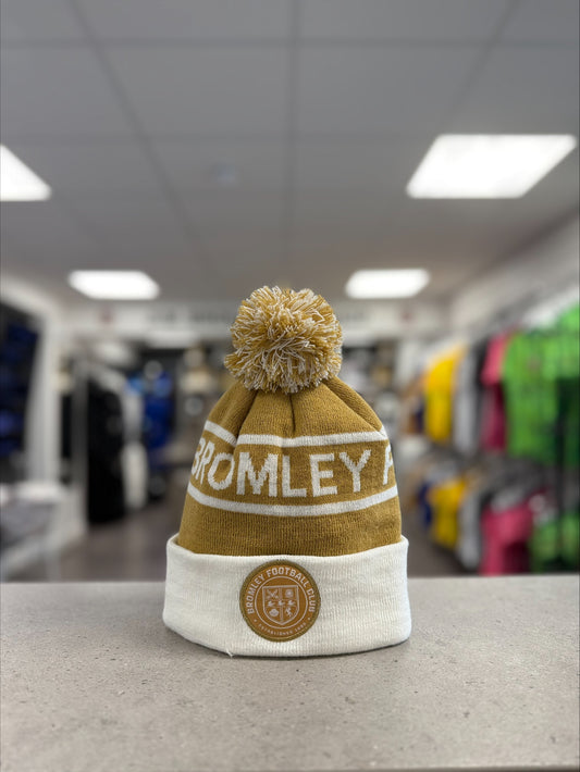 Gold and white bobble hat